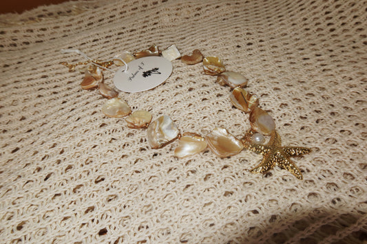 Mother-of-pearl shell bead necklace with gold starfish pendant and pearl drop — Palms of T.